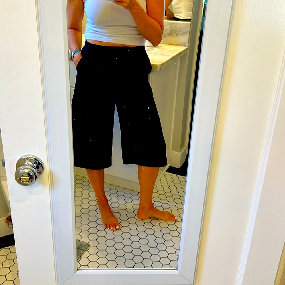 Michael kors black flared below the knee slacks